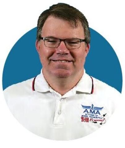 Portrait of Jay Smith wearing an AMA shirt