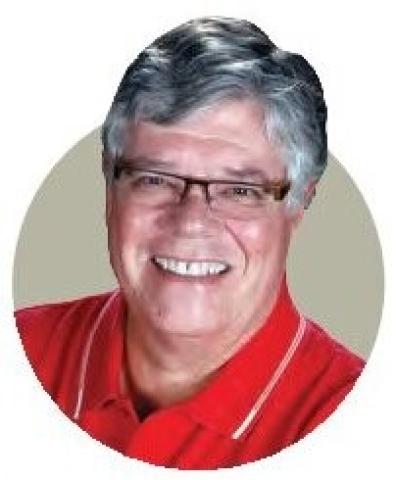 Portrait of Jay Marsh wearing a red shirt