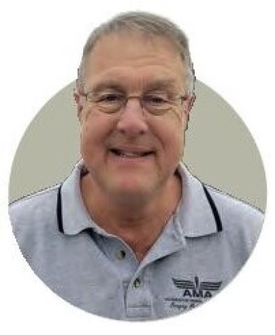 Portrait photograph of Greg Stone.