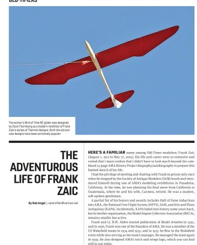 Red-and-white RC glider flying against a blue sky, view from below