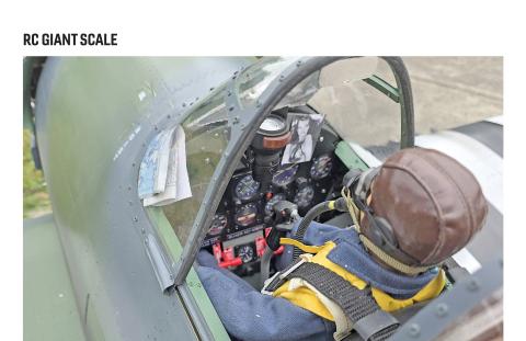 Close-up photo of a scale Hellcat cockpit with pilot figure