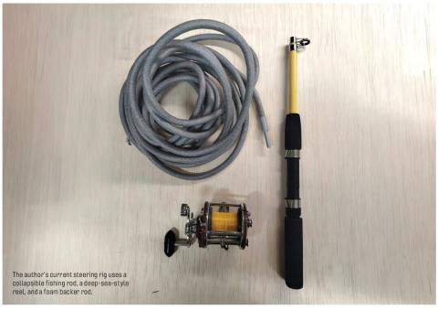 A collapsible fishing rod, fishing reel, and coiled foam backer rod arranged on a wood surface.