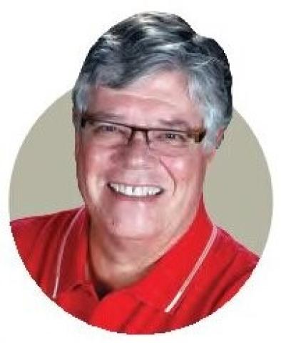 Portrait of Jay Marsh wearing a red shirt