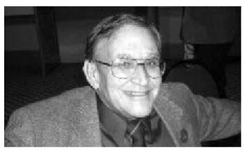 Portrait photograph of Dr. H. Sanford “Sandy” Frank