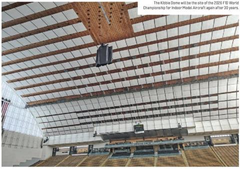 Interior view of the Kibbie Dome with an indoor free-flight model suspended beneath the roof.