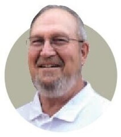 Portrait photograph of Phil Tallman