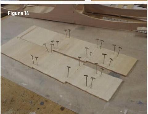 Balsa parts pinned to a work surface during construction